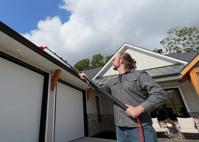 Man cleaning gutters Wide P4 AC 658x470